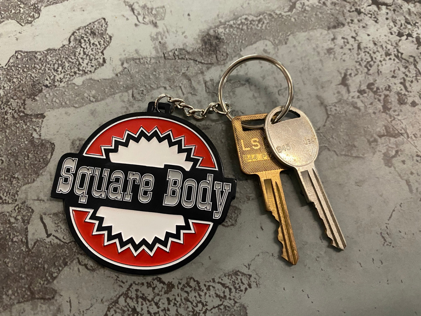 Square Body Round - Metal Keychain Chevy Chevrolet - Stamped Metal Enamel Paint Fill - 2.5 Inches - Oklahoma Customs Original Design