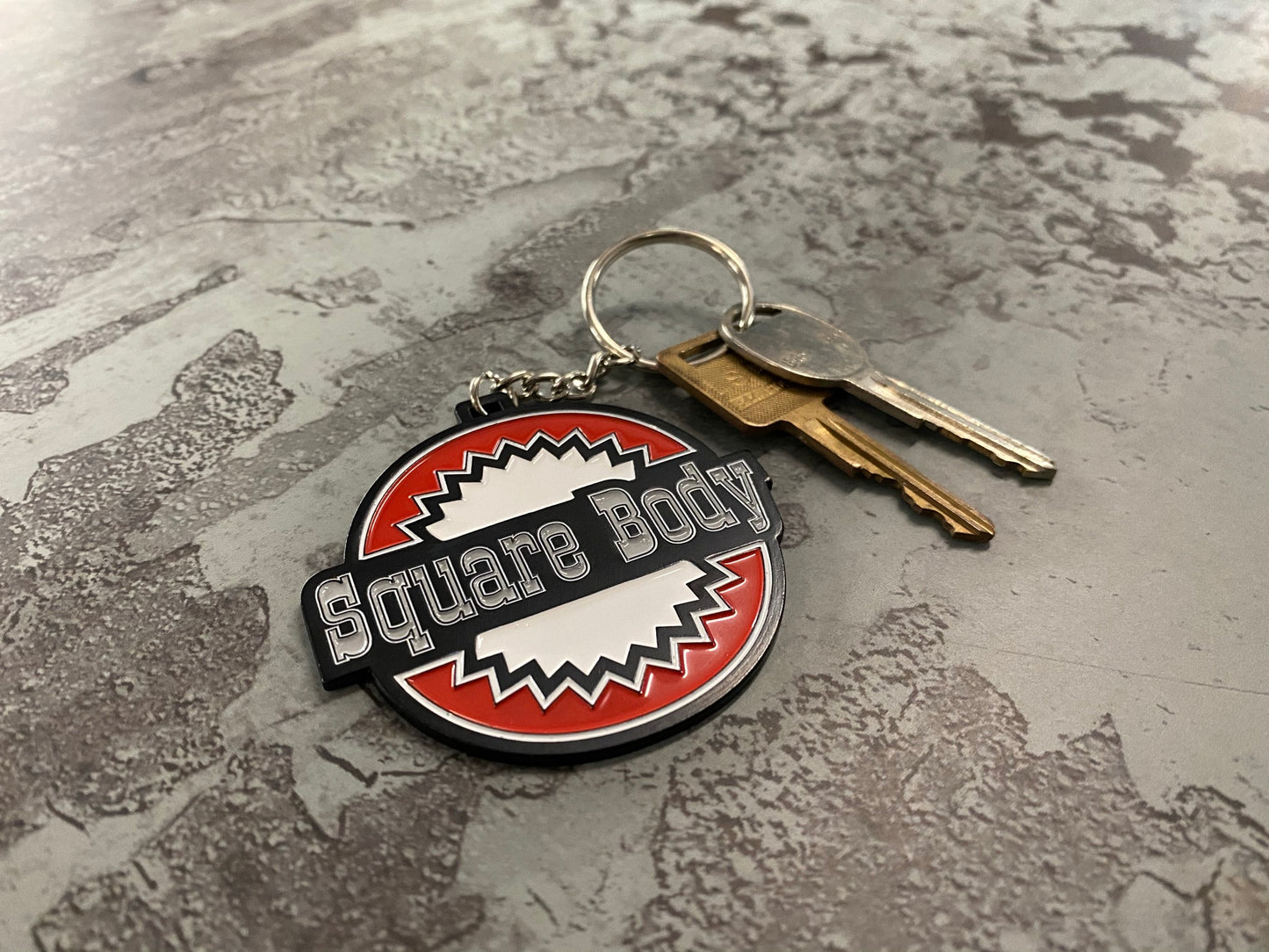 Square Body Round - Metal Keychain Chevy Chevrolet - Stamped Metal Enamel Paint Fill - 2.5 Inches - Oklahoma Customs Original Design