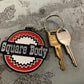 Square Body Round - Metal Keychain Chevy Chevrolet - Stamped Metal Enamel Paint Fill - 2.5 Inches - Oklahoma Customs Original Design